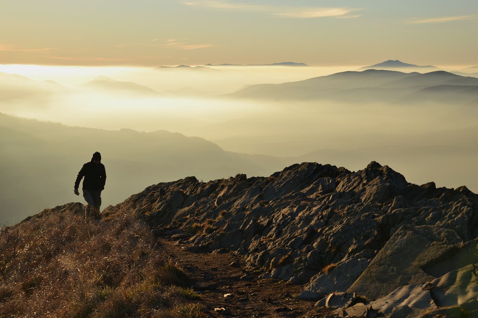 Sunrise over misty ridges in the Bieszczady Mountains